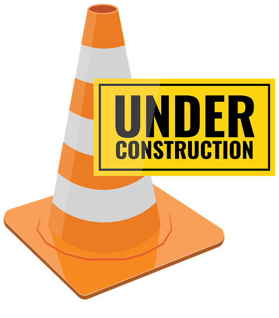 under construction image. orange cone